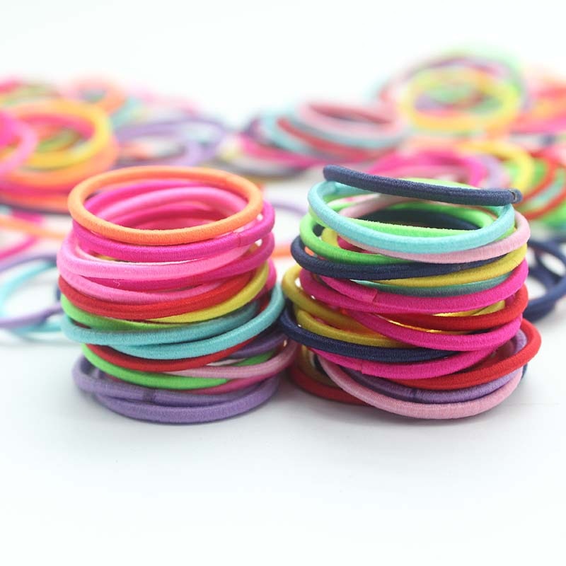 100ชิ้นแถบคาดผมยางยืดสีลูกกวาด - Baby Gear บทวิจารณ์และราคา